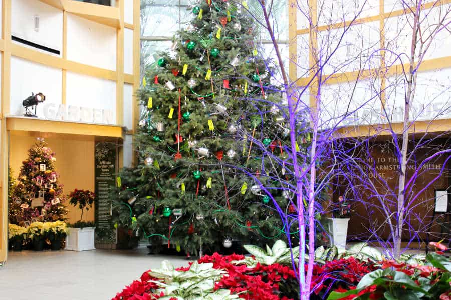 Large decorated Christmas tree in a center court of a museum